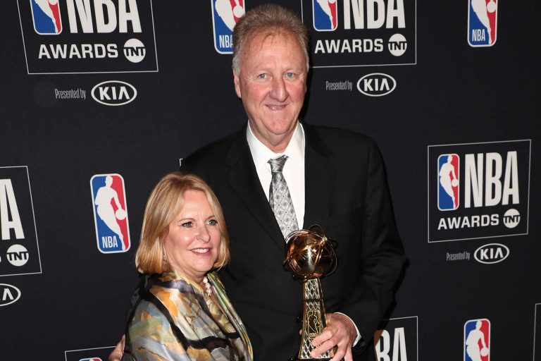 Larry Bird with wife Dinah Mattingly at public event showing supportive relationship