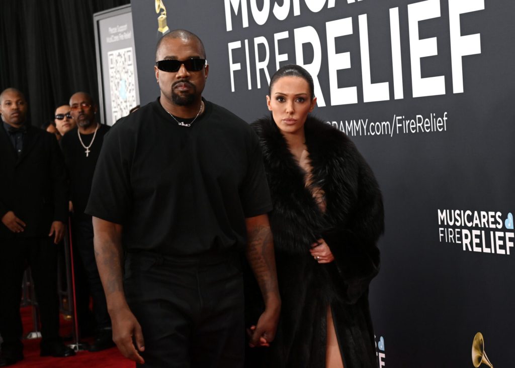 Kanye West with wife Bianca Censori attending event in modern fashion style